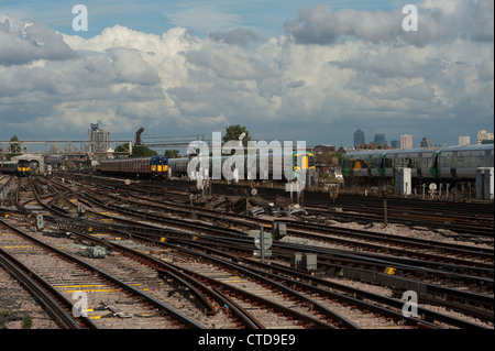 Various trains at Clapham Junction, one of the busiest railway junctions in England. Stock Photo