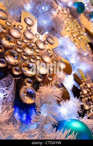 close up of a metallic crystal star decor on white fir Stock Photo