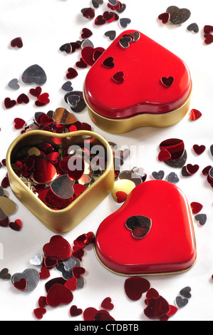 Big and little hearts scattered on a table UK Stock Photo