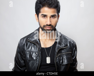 Casual man in a black leather jacket Stock Photo