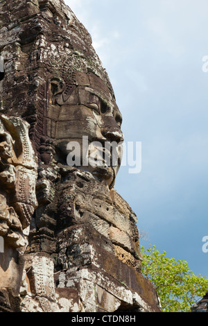 Carved stone faces of Bayon temple in Angkor Thom, Cambodia Stock Photo