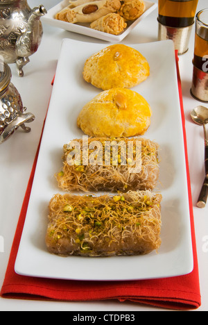 Turkish pastry: in front two Kadayif , behind two Sekerpare, Turkish food, Turkey Stock Photo