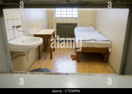 Prisoner cell in East German secret Police STASI Prison at Hohenschönhausen in Berlin Germany Stock Photo