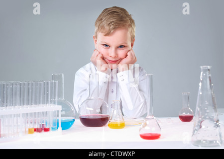 Cute boy taking part in the school scientific project Stock Photo