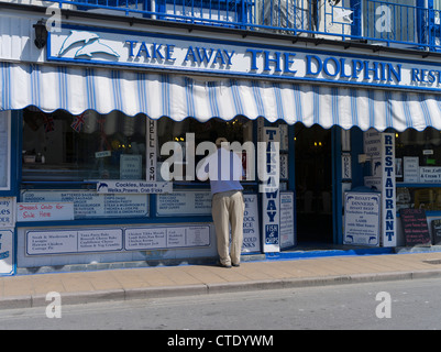 dh Dolphin Restaurant England UK ILFRACOMBE DEVON Traditional seaside cafe town seafront tourist fish chip takeaway restaurant chips britain Stock Photo