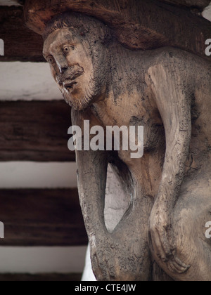 A carved oak satyr on the corner of Bull House,for a time the home of Thomas Paine in Lewes,East Sussex. Stock Photo