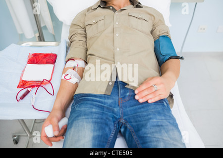 Male patient receiving a blood transfusion Stock Photo