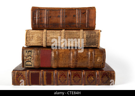 stack of old books from 1500's unbranded on white Stock Photo