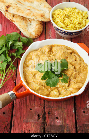 Indian Chicken Curry with Rice and Naan Breads Stock Photo