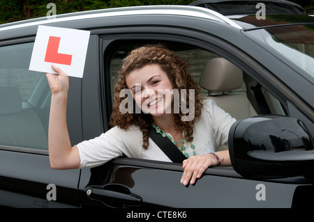 Young female driver holding L learner Stock Photo