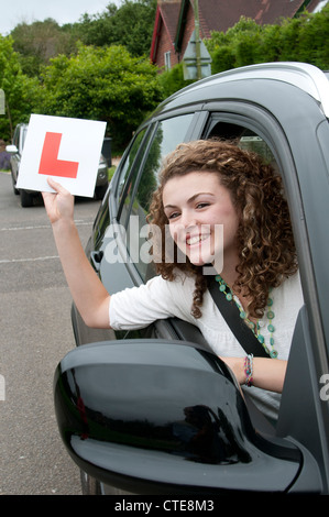 Young female driver holding L learner Stock Photo