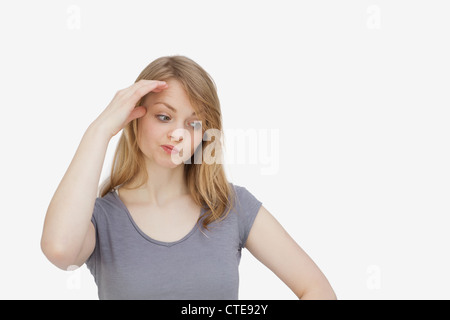 Woman being lost in thought Stock Photo
