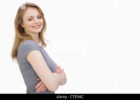 Side view of a woman with arms crossed Stock Photo