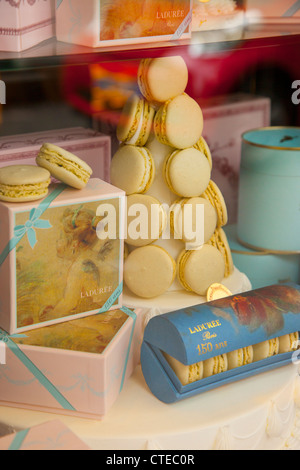 Window display of Laduree Bakery, Patisserie, and Tea Shop, Saint-Germain-des-Pres, Paris France Stock Photo