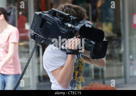 Television TV Cameraman with SONY XDCAM Power HAD FX HDVS Multiscan Digital TV Camera Fujinon Super Wide TV Zoom Lense Heilbronn Stock Photo