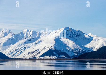 Early morning light on beautiful blue waters of 'Turnagain Arm,' which branches off of 'Cook Inlet' in Alaska. Stock Photo