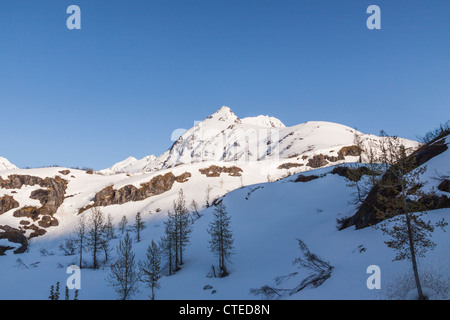 Snow and ice in the Chugach Mountains of Alaska, visible from the Alaska Railroad train ride from Seward to Anchorage, Alaska. Stock Photo