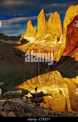 Towers with reflection at sunrise, Torres del Paine National Park, Patagonia, Chile Stock Photo