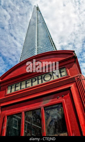 Icons...the Shard and a telephone box - old and new, red and blue! London, South Bank Stock Photo