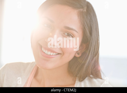 Portrait of young woman smiling Stock Photo