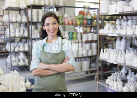 USA, New Jersey, Jersey City, Woman in pottery warehouse Stock Photo