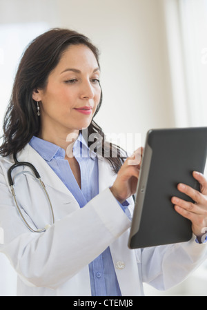 USA, New Jersey, Jersey City, Female doctor using digital tablet Stock Photo