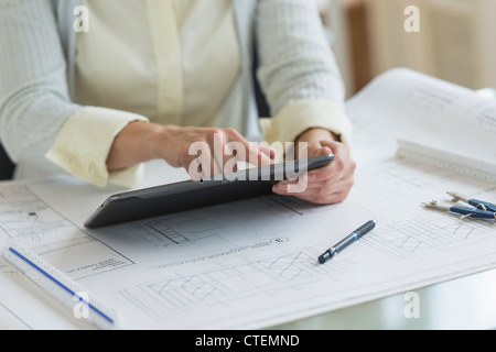 USA, New Jersey, Jersey City, Architect working on digital tablet Stock Photo