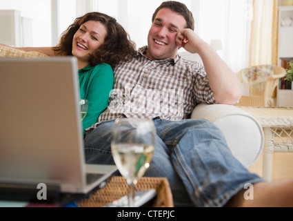 USA, New Jersey, Jersey City, Couple watching movie on laptop Stock Photo