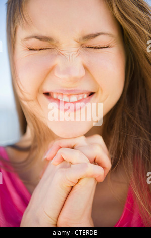 USA, New Jersey, Jersey City, Close-up of praying woman Stock Photo