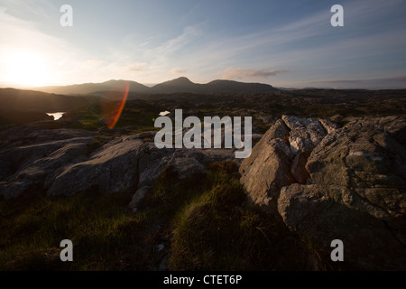 Isle of Harris, Scotland. Silhouetted sunset view over Harris’s hills and mountains. Stock Photo