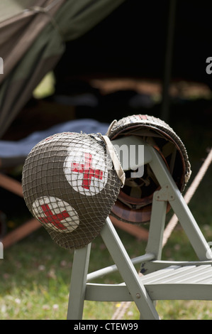 US Army Medical Corps helmet outside a period tent at the Flying Legends Airshow 2011, Imperial War Museum, Duxford Stock Photo