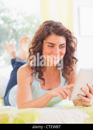 USA, New Jersey, Jersey City, Woman using digital tablet Stock Photo