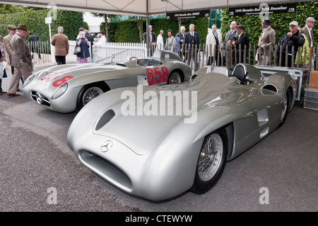Mercedes W196 Streamliner and Fangio's 300SLR in the paddock at the 2011 Goodwood Revival Stock Photo