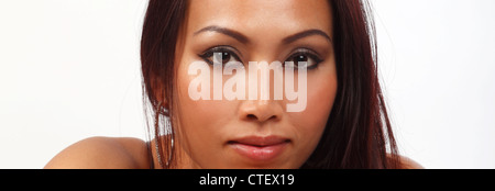 close up head shot of a Thai womans face Stock Photo