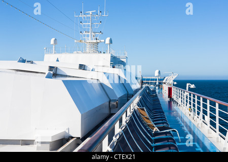 sunbath chairs on side of cruise liner Stock Photo