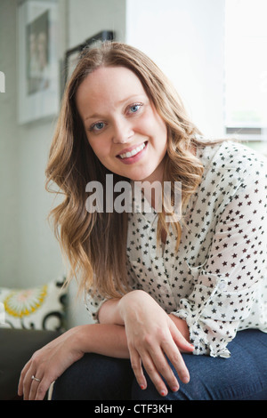 USA, Utah, Salt Lake City, Portrait of happy young woman Stock Photo