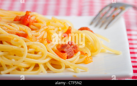 Close up of spaghetti alla carbonara, over white plate Stock Photo