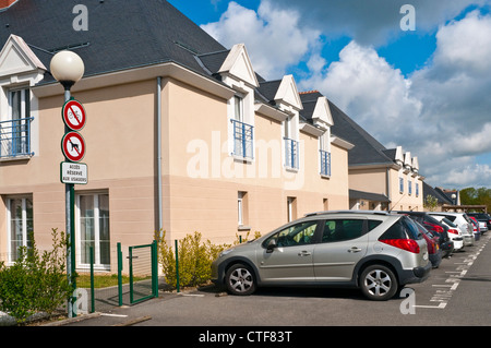 'No Cycling' and 'No Dogs' signs / council apartments - France. Stock Photo