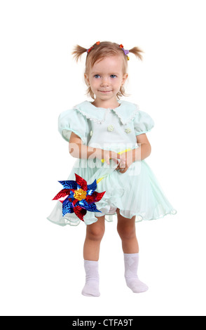 Young girl happy with wind toy on the white background Stock Photo