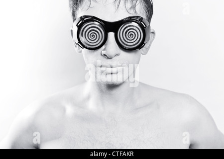 young man with white skin in strange glasses closeup Stock Photo