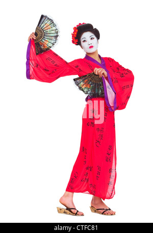 Full length portrait of geisha dancing with fans isolated on white Stock Photo