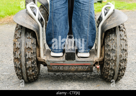 Person standing on a Segway personal transportation Stock Photo