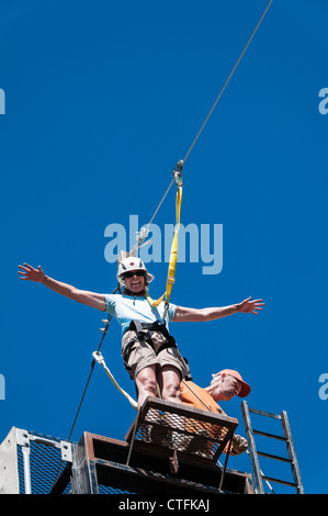 Woman on the zipline, Summit Chateau Lodge, Brian Head, Utah. Stock Photo