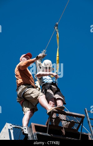 Woman on the zipline, Summit Chateau Lodge, Brian Head, Utah. Stock Photo