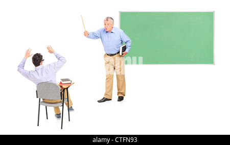 Angry male teacher yelling at a male student Stock Photo