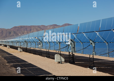 Solar collection panels at a solar power plant in the Mojave Desert in California Stock Photo
