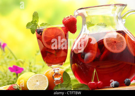 Refreshing sangria (punch) with fruits,Closeup. Stock Photo