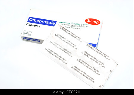 Capsules containing Omeprazole as gastro - resistant granules Stock Photo