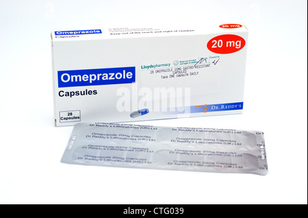 Capsules containing Omeprazole as gastro - resistant granules Stock Photo