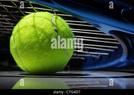 Tennis racket and ball Stock Photo